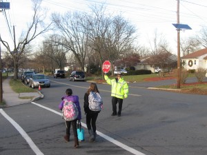 One basic back to school safety tips is to follow a crossing guard’s lead.