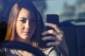 If you want a distracted driving ticket asap, take a selfie of yourself in motion.