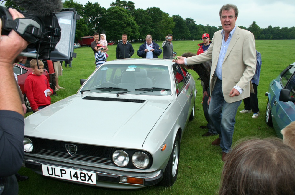 Jeremy Clarkson next to a Beta Coupe in Stanford Hall