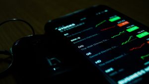 A smartphone displaying stock prices.